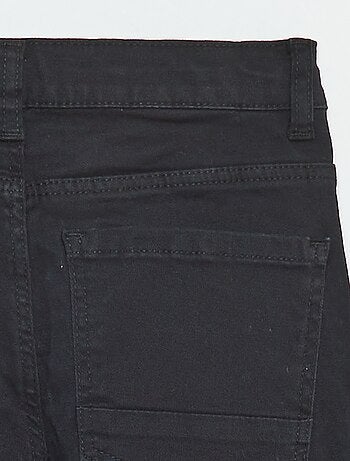 Pantaloni taglio skinny / modello molto aderente a 5 tasche