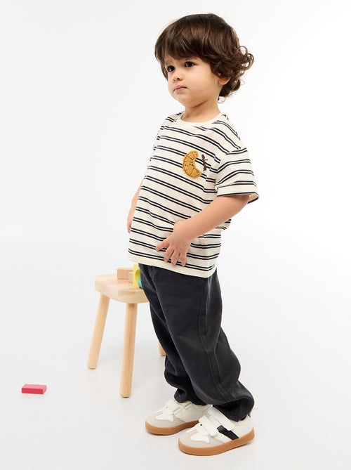 Pantaloni tinta unita in materiale morbido con taglio relax fit - Kiabi