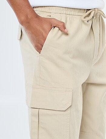Pantaloni tinta unita multitasche con vita elasticizzata
