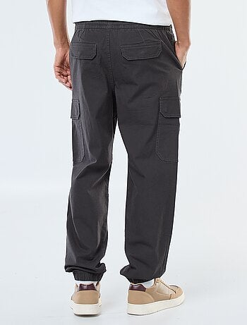 Pantaloni tinta unita multitasche con vita elasticizzata