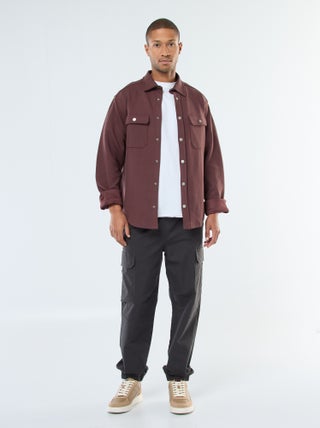 Pantaloni tinta unita multitasche con vita elasticizzata