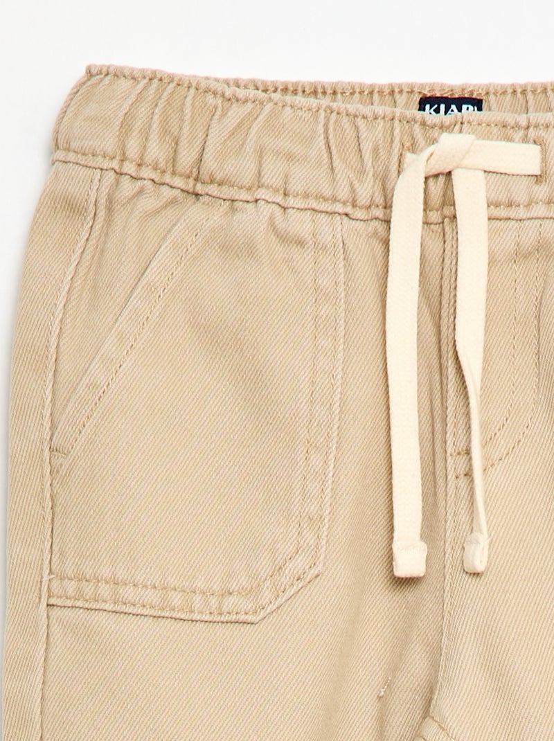Pantaloni tinta unita taglio relaxed fit Beige - Kiabi