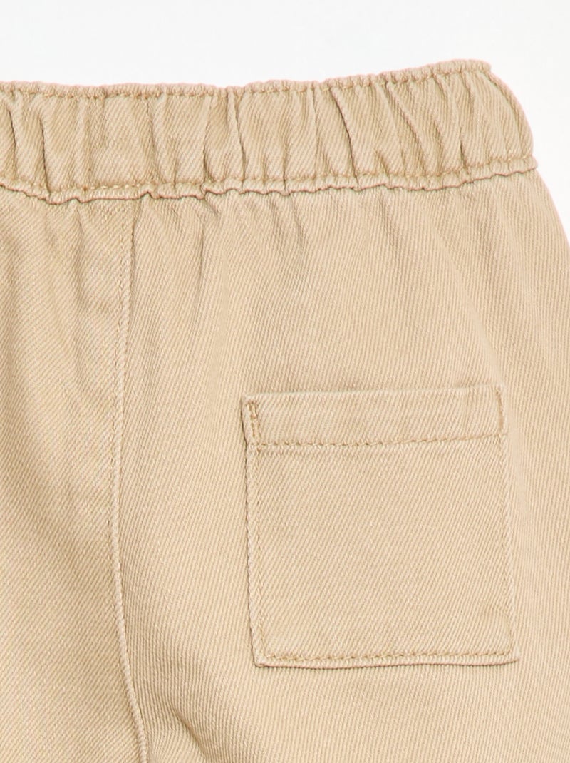 Pantaloni tinta unita taglio relaxed fit Beige - Kiabi