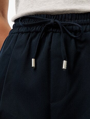 Pantalone tipo jogger tinta unita