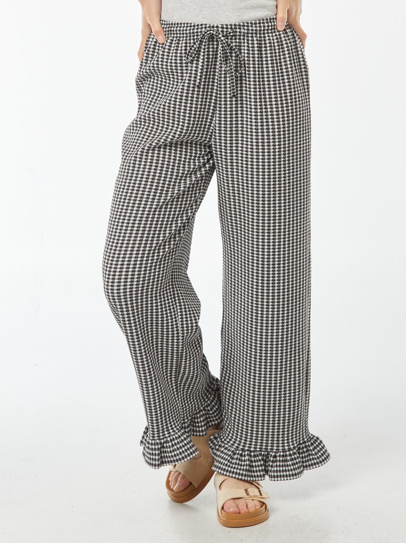 Pantaloni vichy con volant sul fondo Nero - Kiabi