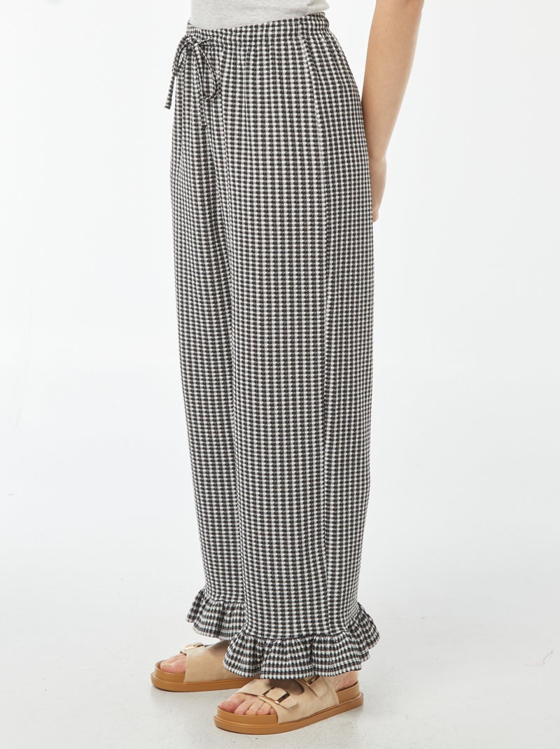 Pantaloni vichy con volant sul fondo Nero - Kiabi
