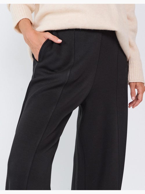 Pantaloni wide leg in maglia interlock, mo fashion - Kiabi Pantaloni wide leg in maglia interlock, mo fashion - Kiabi
