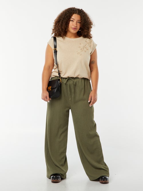 Pantaloni wide leg in tessuto plissettato - Kiabi