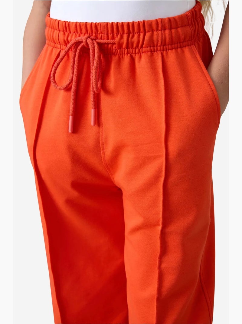 Pantaloni youth unisex in misto cotone tommy Arancione - Kiabi