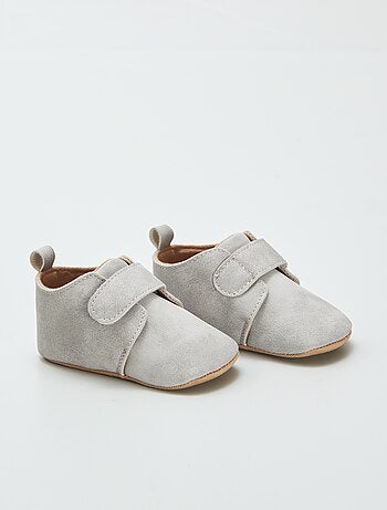 Pantofole a stivaletto con strappi