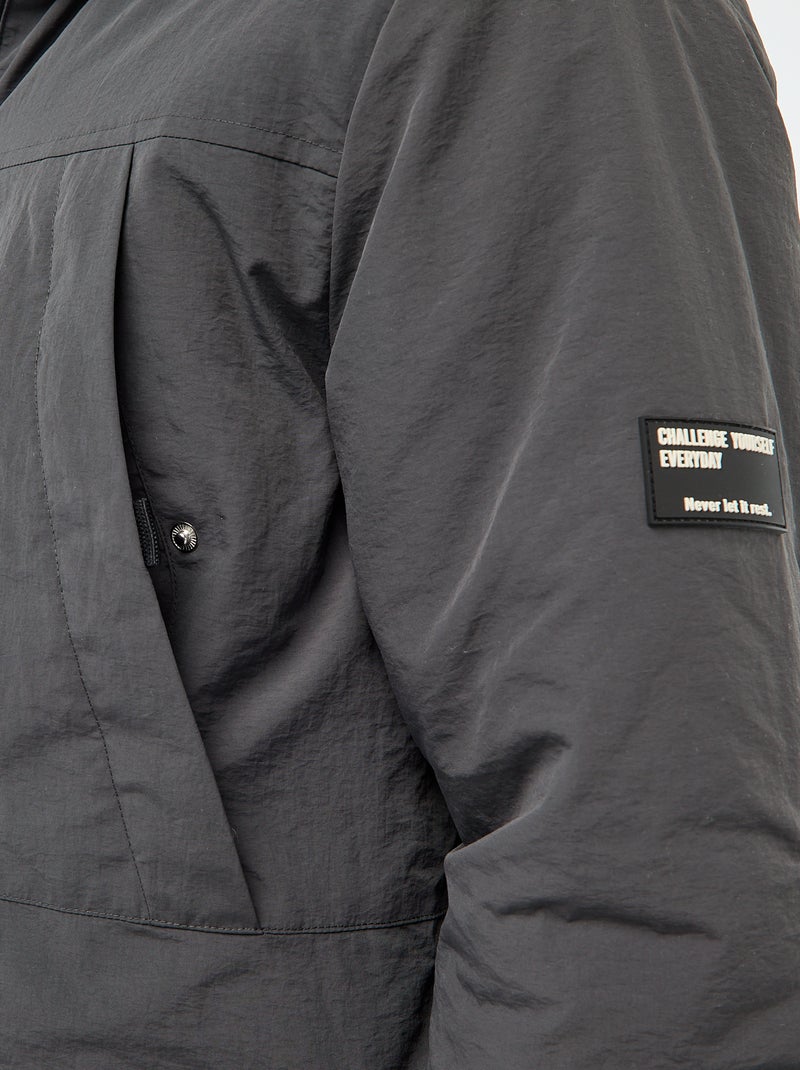 Parka leggera con cappuccio idrorepellente Nero - Kiabi