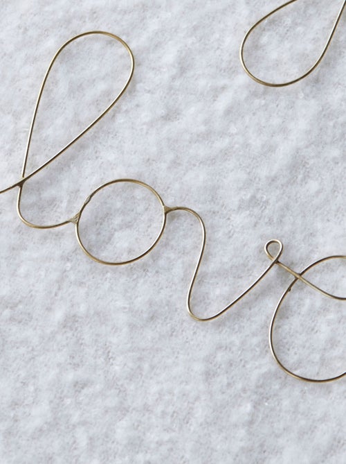 Parola in filo d'ottone dorato "LOVE - Kiabi