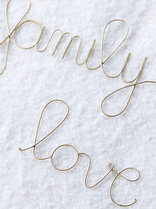 Parola in filo d'ottone dorato "LOVE - Kiabi