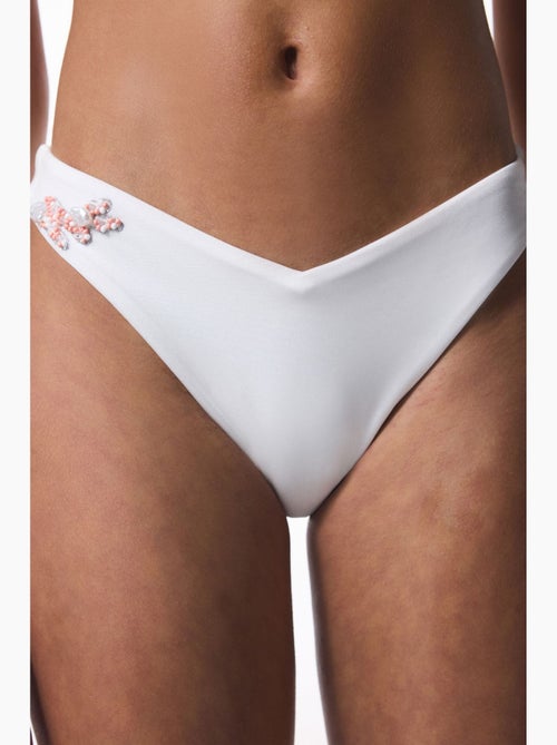 Pearl slip bikini con scollo a v e perline penti - Kiabi Pearl slip bikini con scollo a v e perline penti - Kiabi