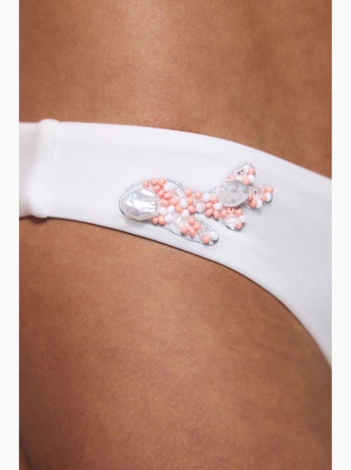 Pearl slip bikini con scollo a v e perline penti - Kiabi Pearl slip bikini con scollo a v e perline penti - Kiabi