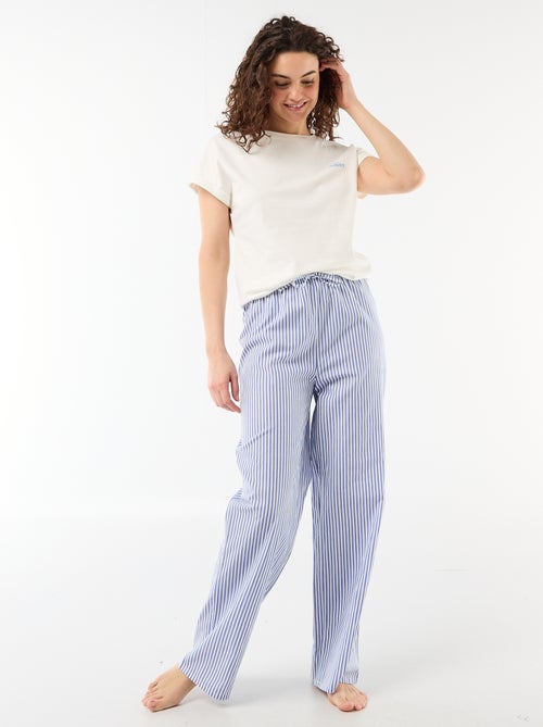 Pigiama completo t-shirt + pantaloni a righe - 2 pezzi - Kiabi Pigiama completo t-shirt + pantaloni a righe - 2 pezzi - Kiabi