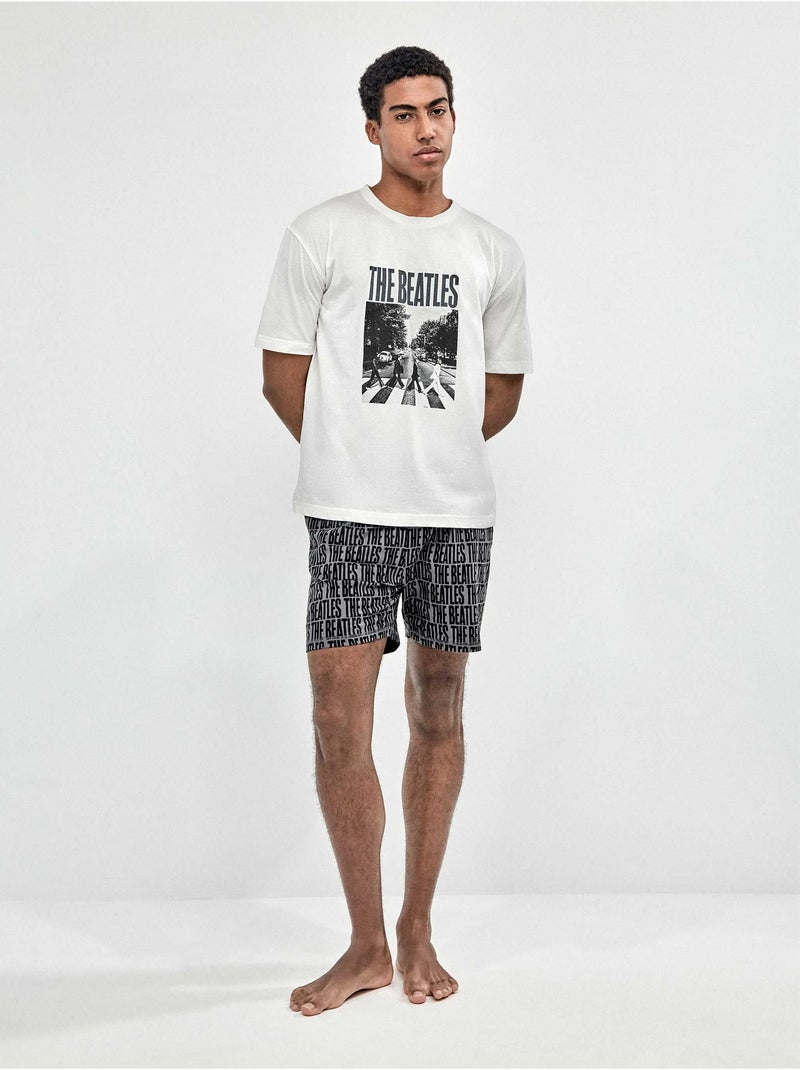 Pigiama da uomo con stampa The Beatles Bianco - Kiabi