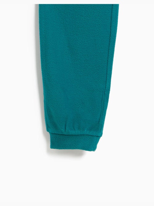 Pigiama in pile a righe, mo fashion - Kiabi Pigiama in pile a righe, mo fashion - Kiabi