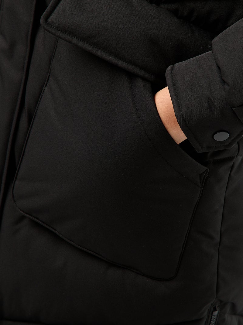 Piumino caldo lungo idrorepellente con cappuccio Nero - Kiabi