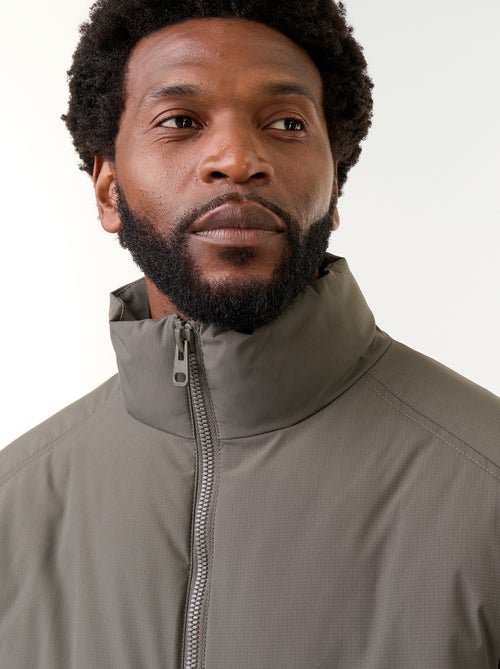 Piumino collo alto maniche raglan - Kiabi Piumino collo alto maniche raglan - Kiabi
