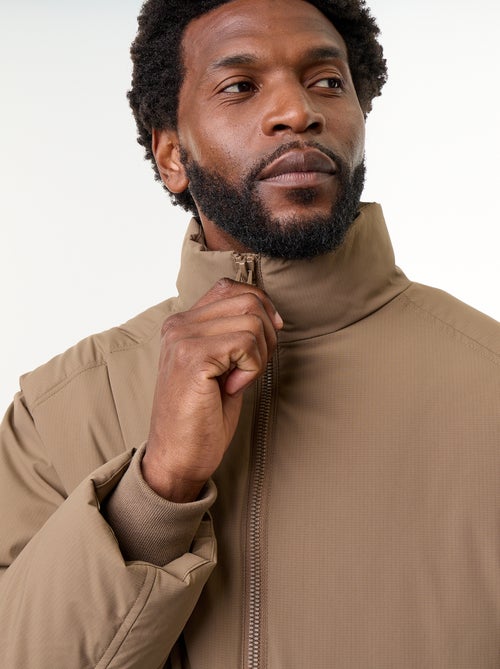 Piumino collo alto maniche raglan - Kiabi Piumino collo alto maniche raglan - Kiabi