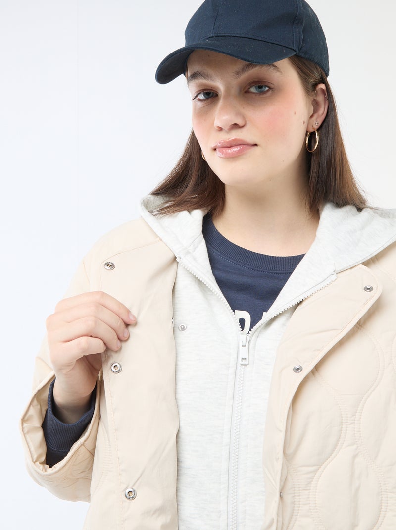 Piumino con cappuccio e pettorina interna in felpa removibile Beige - Kiabi