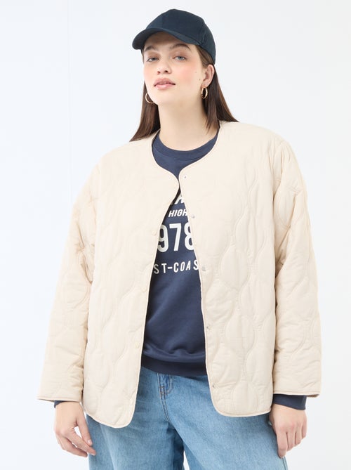 Piumino con cappuccio e pettorina interna in felpa removibile - Kiabi Piumino con cappuccio e pettorina interna in felpa removibile - Kiabi