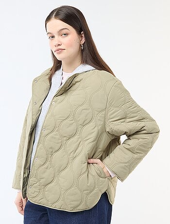 Piumino con cappuccio e pettorina interna in felpa removibile