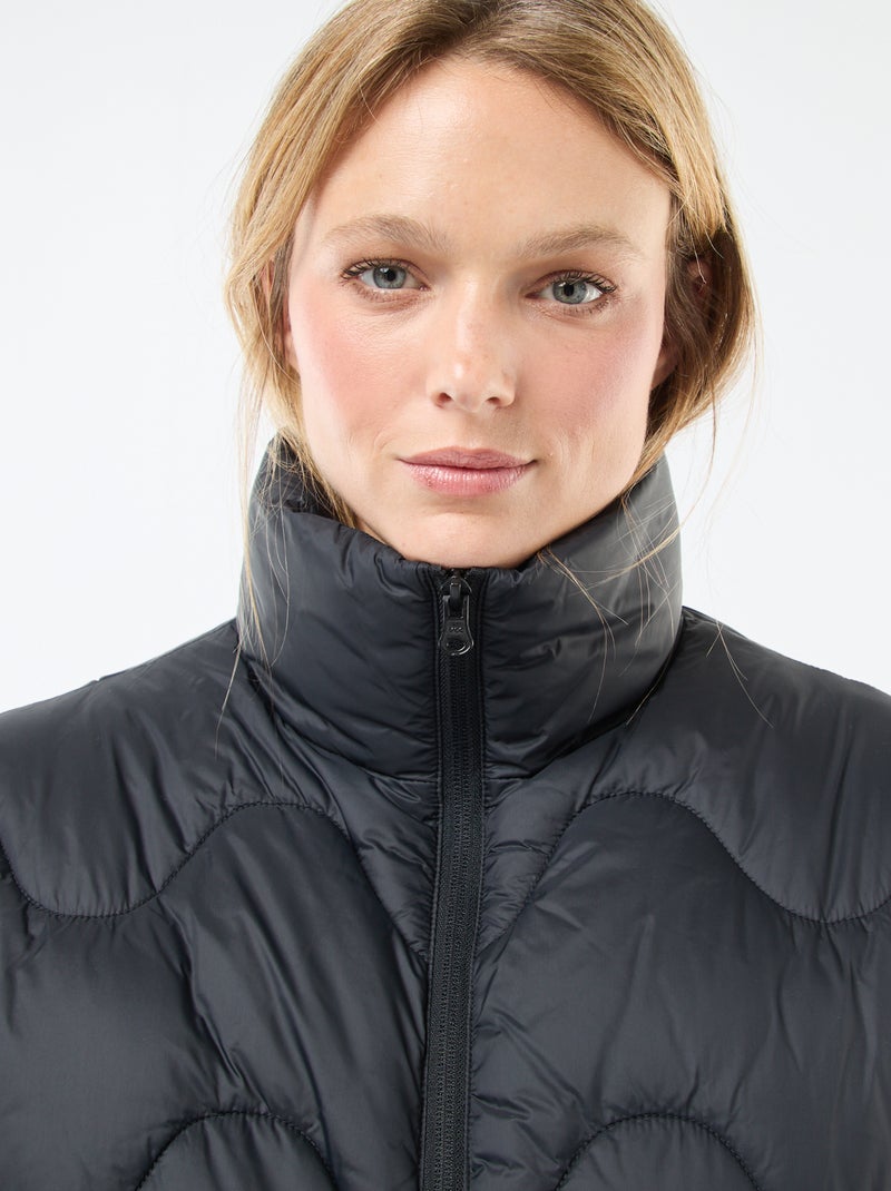 Piumino corto con collo alto e tasche foderate in pile Nero - Kiabi