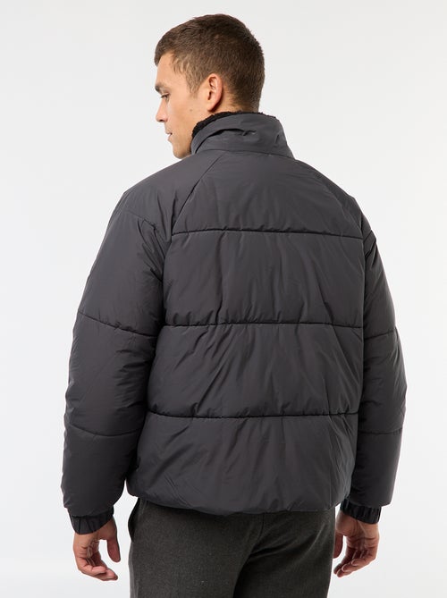 Piumino idrorepellente tinta unita con coulisse sul fondo - Kiabi