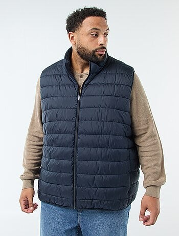 Piumino leggero smanicato con collo alto