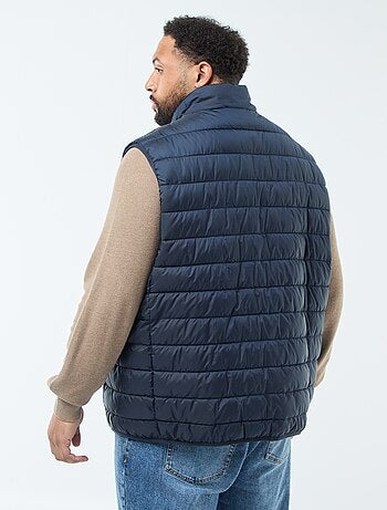 Piumino leggero smanicato con collo alto