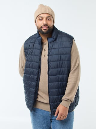 Piumino leggero smanicato con collo alto