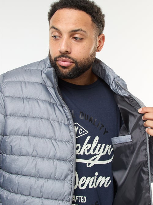 Piumino leggero tinta unita a maniche lunghe e collo alto - Kiabi