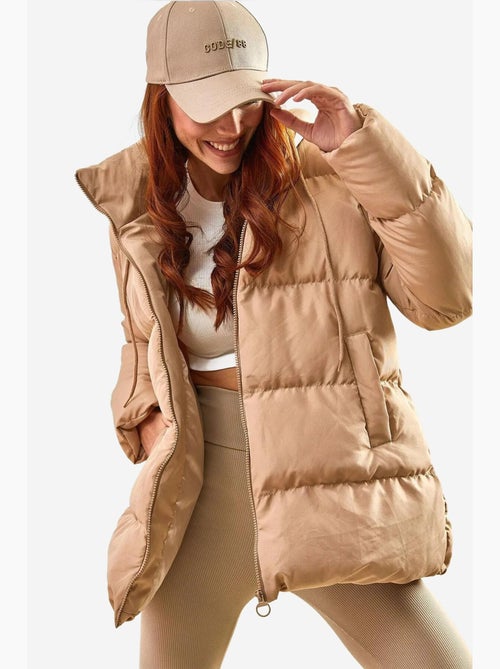 Piumino lungo con cappuccio con coulisse lucci - Kiabi Piumino lungo con cappuccio con coulisse lucci - Kiabi
