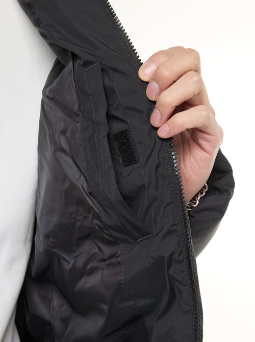 Piumino lungo con cappuccio tinta unita - Kiabi