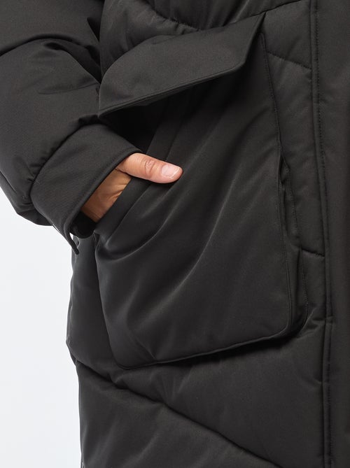 Piumino lungo trapuntato con cappuccio e tasche foderate in pile - Kiabi