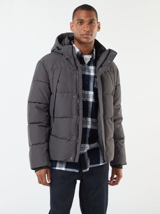 Piumino pesante con cappuccio zippato