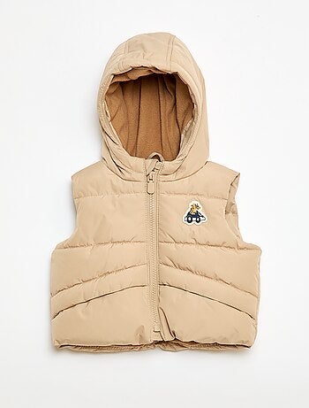 Piumino smanicato con cappuccio trapuntato