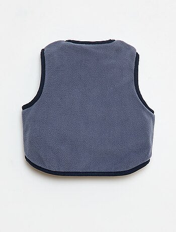 Piumino smanicato con fodera in pile
