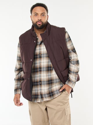 Piumino smanicato idrorepellente tinta unita