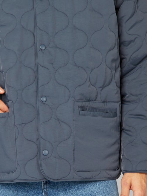 Piumino trapuntato con maniche staccabili - Kiabi