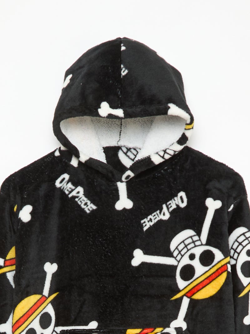 Plaid poncho bambino con cappuccio in pile 'One piece' Nero - Kiabi