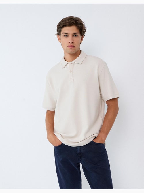 Polo a maglia texturizzata, mo fashion - Kiabi Polo a maglia texturizzata, mo fashion - Kiabi