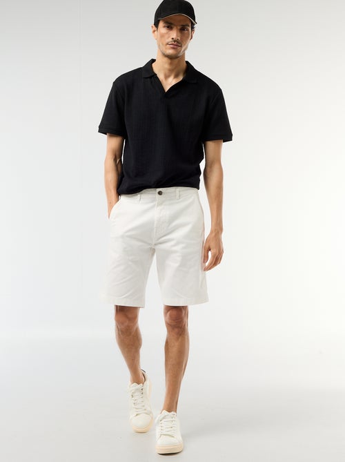 Polo a maniche corte in tessuto a nido d'ape - Kiabi Polo a maniche corte in tessuto a nido d'ape - Kiabi