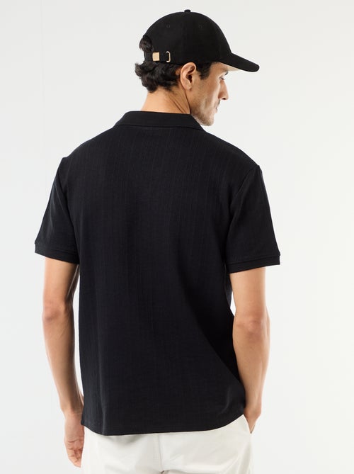 Polo a maniche corte in tessuto a nido d'ape - Kiabi Polo a maniche corte in tessuto a nido d'ape - Kiabi