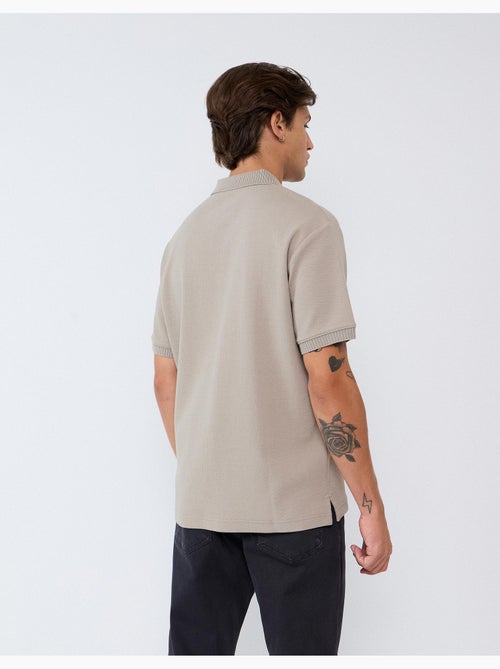 Polo a maniche corte, mo fashion - Kiabi Polo a maniche corte, mo fashion - Kiabi