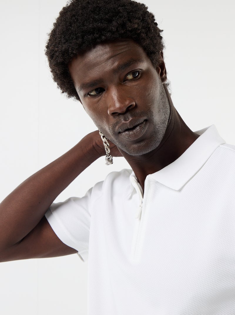 Polo a nido d'ape con collo a zip Bianco - Kiabi