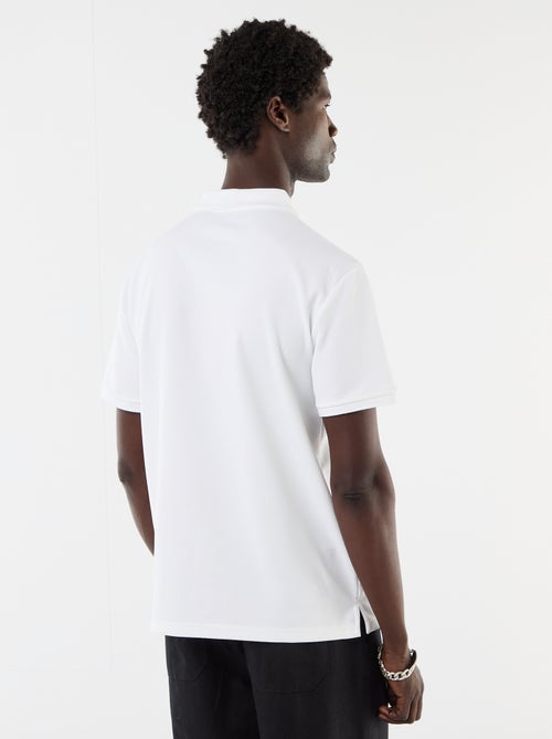 Polo a nido d'ape con collo a zip - Kiabi