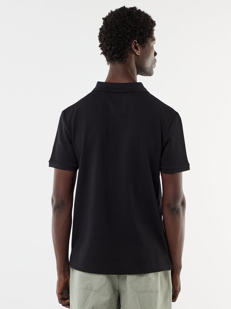 Polo a nido d'ape con collo a zip Nero - Kiabi